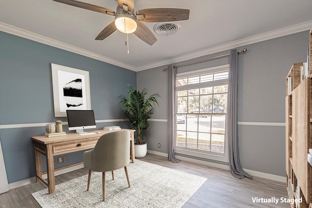 office area with ceiling fan, visible vents, crown molding, and wood finished floors