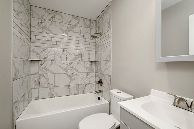 bathroom with vanity, toilet, and shower / washtub combination