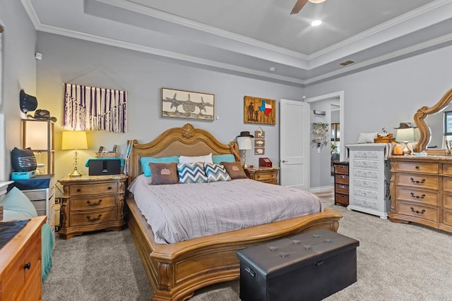 6811 Elkins Rd, Midland, TX 79705 - carpeted bedroom with a tray ceiling, crown molding, ceiling fan, and recessed lighting