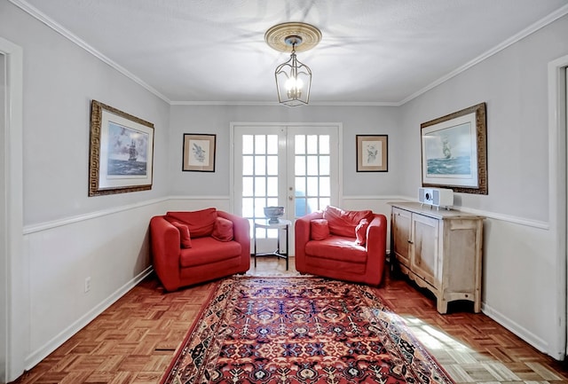 sitting room with french doors, ornamental molding, and light parquet floors