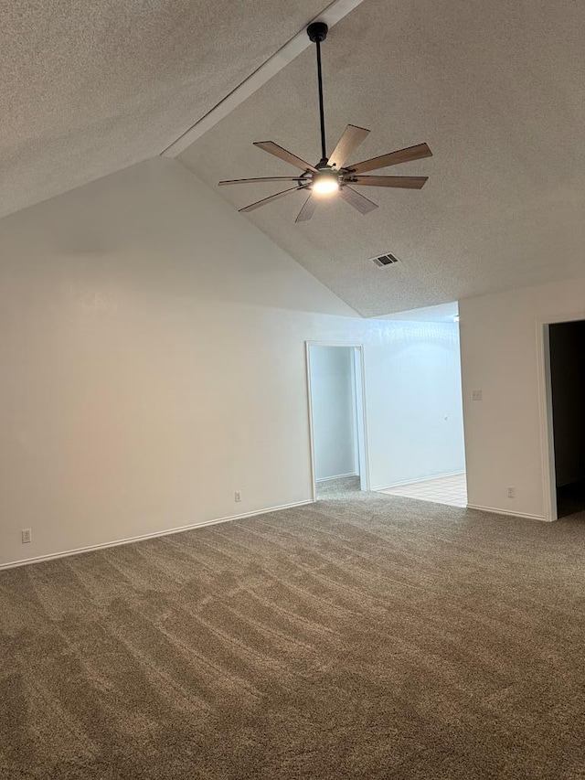 unfurnished room with visible vents, a ceiling fan, a textured ceiling, carpet flooring, and baseboards