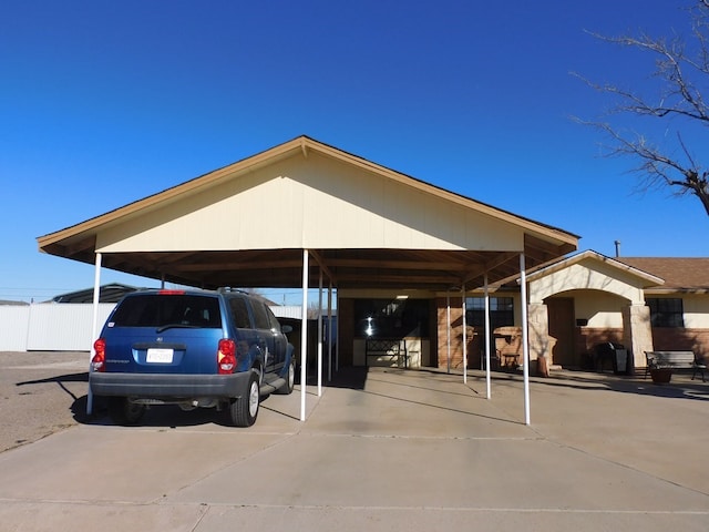 view of parking featuring a carport