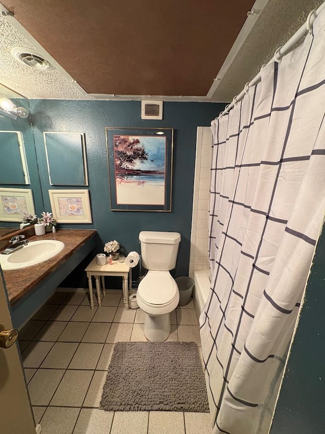 full bathroom with visible vents, tile patterned flooring, toilet, and vanity