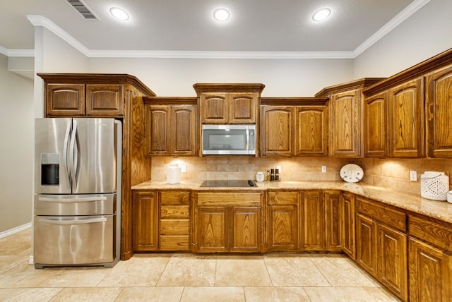 kitchen with light stone counters, stainless steel appliances, tasteful backsplash, visible vents, and ornamental molding