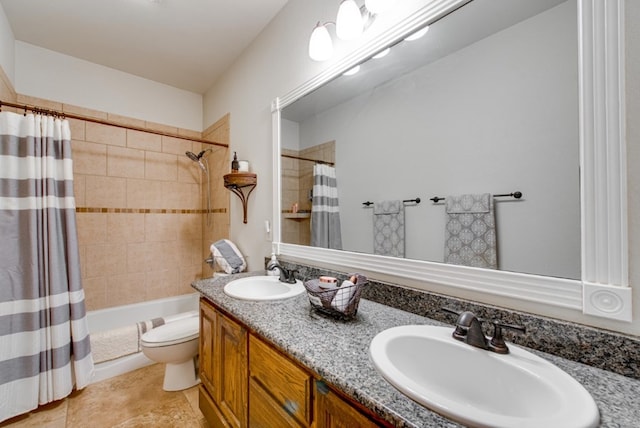 bathroom featuring shower / bath combo, a sink, toilet, and double vanity