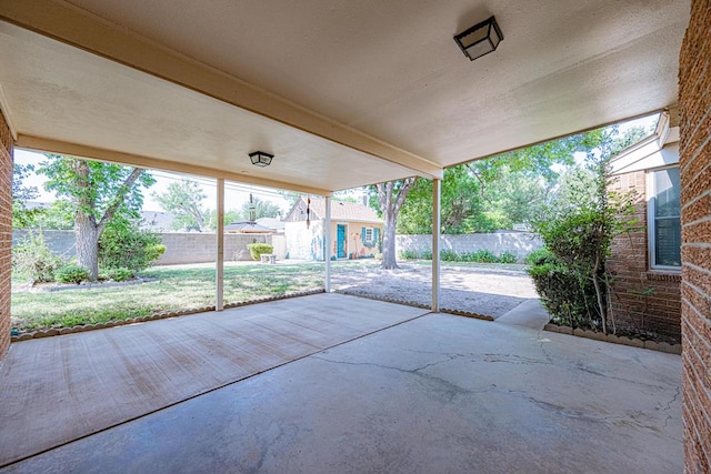 3525 Stanolind Ave, Midland, TX 79707 - fenced backyard with an outbuilding and a patio