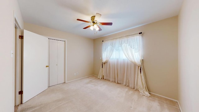 3525 Stanolind Ave, Midland, TX 79707 - unfurnished bedroom featuring light colored carpet, a closet, and ceiling fan