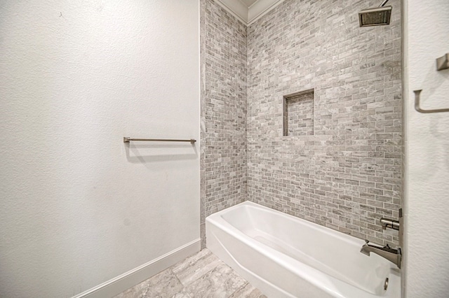 bathroom with washtub / shower combination