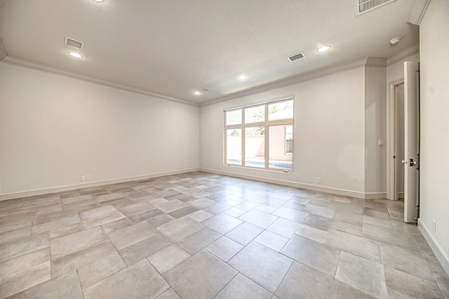 unfurnished room featuring crown molding