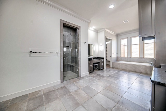 bathroom featuring plus walk in shower, vanity, tile patterned floors, and ornamental molding