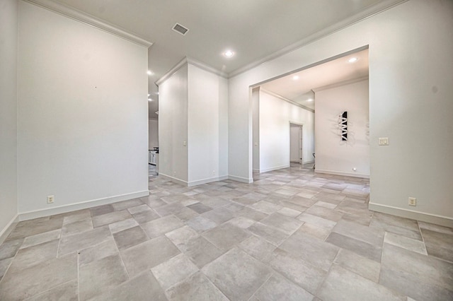 unfurnished room featuring crown molding