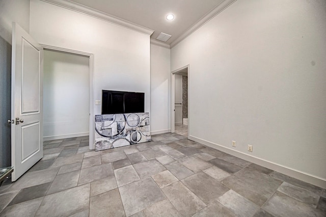 unfurnished living room with ornamental molding