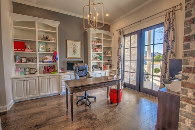 home office with a chandelier, french doors, ornamental molding, and dark wood-style flooring