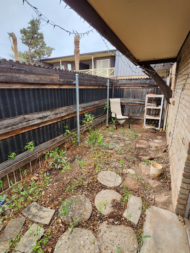 501 W Scharbauer Dr Unit 30, Midland, TX 79705 - view of yard featuring a fenced backyard