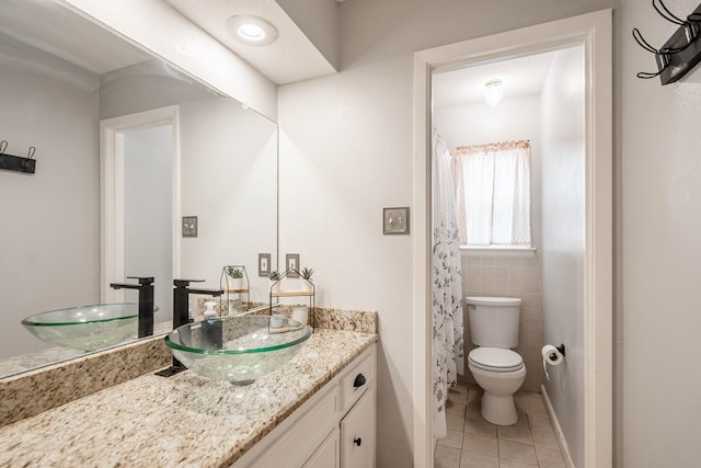 3702 W Michigan Ave, Midland, TX 79703 - full bath featuring tile patterned floors and vanity