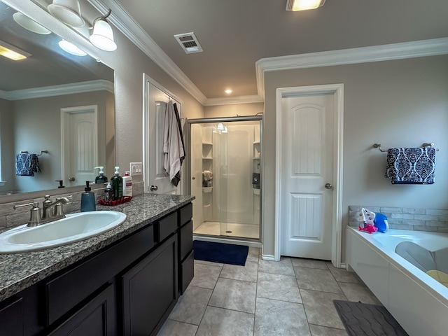 bathroom featuring tile patterned flooring, ornamental molding, shower with separate bathtub, and vanity