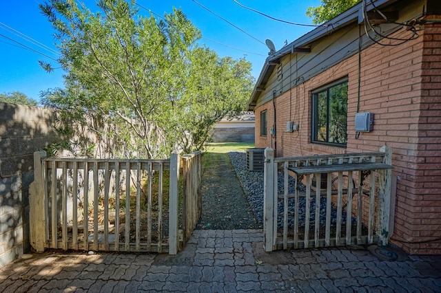 view of gate with central AC unit