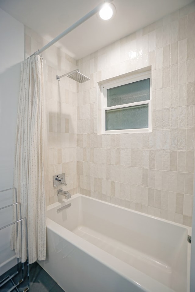 bathroom featuring shower / bath combination with curtain