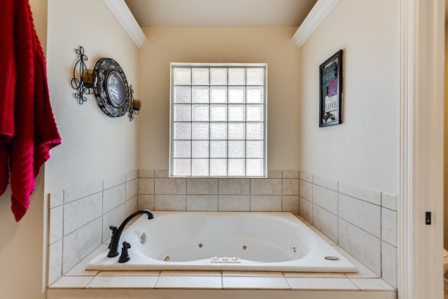 5913 Prairie Rdg, Midland, TX 79707 - bathroom featuring ornamental molding and a jetted tub