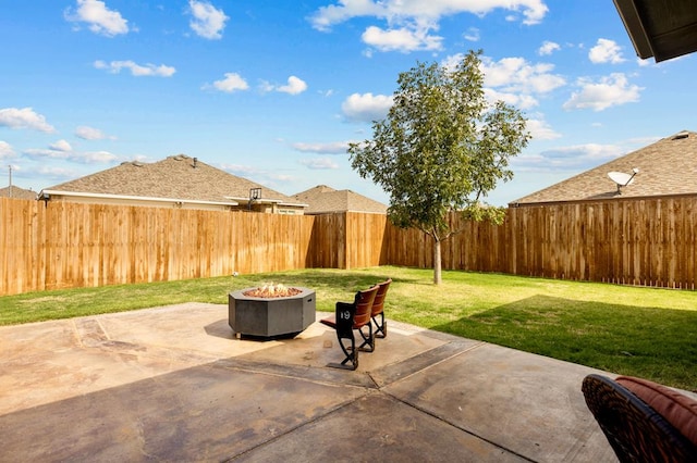 view of patio with a fire pit