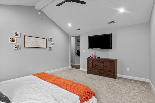 carpeted bedroom with vaulted ceiling with beams and ceiling fan