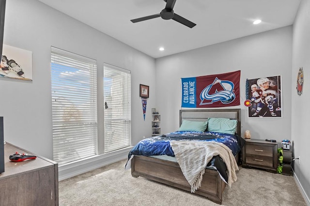 carpeted bedroom with ceiling fan