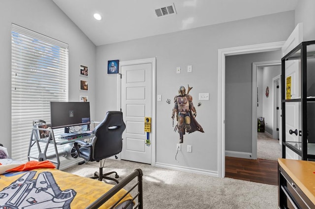 office space with wood-type flooring and lofted ceiling