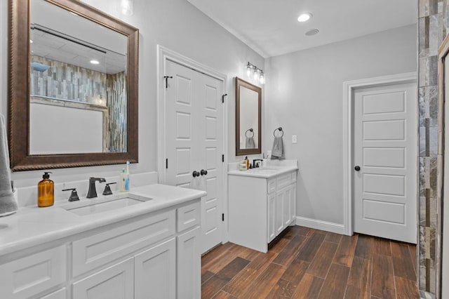 bathroom featuring vanity and hardwood / wood-style flooring