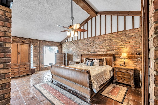 1510 W School St, Stanton, TX 79782 - bedroom with vaulted ceiling, a textured ceiling, brick wall, and ceiling fan