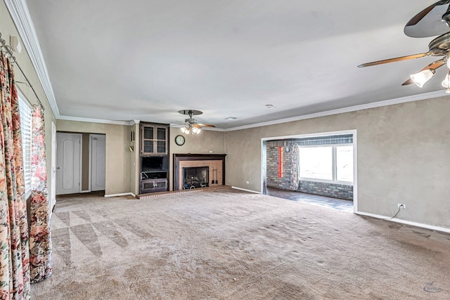 1510 W School St, Stanton, TX 79782 - unfurnished living room featuring a ceiling fan, a fireplace, carpet floors, baseboards, and ornamental molding