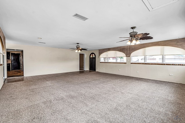 1510 W School St, Stanton, TX 79782 - carpeted spare room featuring a ceiling fan and attic access