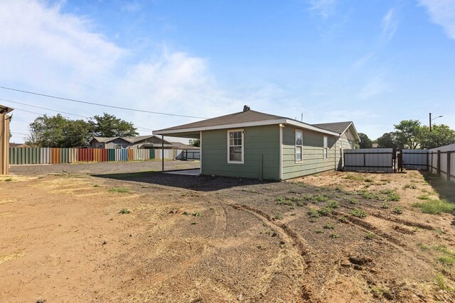 610 S Clay St, Midland, TX 79701 - rear view of property with a fenced backyard