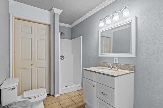 610 S Clay St, Midland, TX 79701 - full bath with toilet, crown molding, a shower stall, vanity, and tile patterned flooring