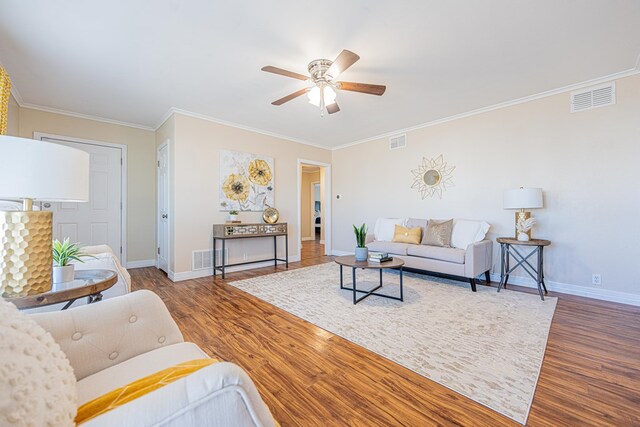 1207 Kansas, Midland, TX 79705 - living room featuring wood finished floors, ceiling fan, and ornamental molding