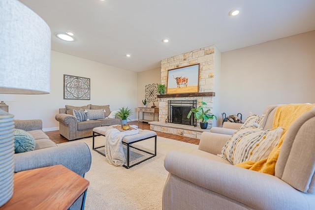 1207 Kansas, Midland, TX 79705 - living area featuring a fireplace, wood finished floors, and recessed lighting