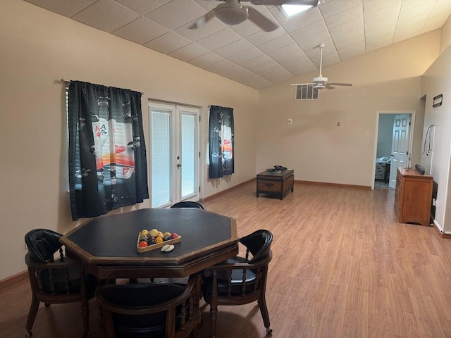 1207 Kansas, Midland, TX 79705 - dining room with a ceiling fan, light wood finished floors, and lofted ceiling