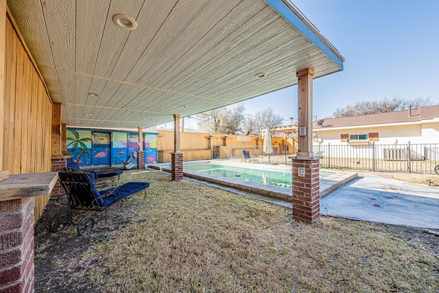 1207 Kansas, Midland, TX 79705 - fenced backyard with a patio area