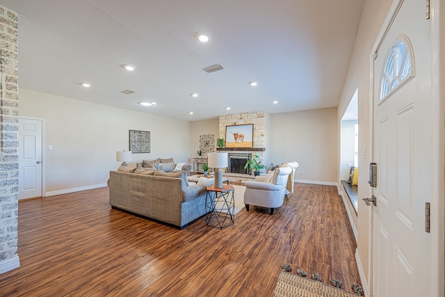 1207 Kansas, Midland, TX 79705 - living area featuring dark wood-style flooring, a fireplace, and recessed lighting