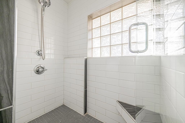 1207 Kansas, Midland, TX 79705 - full bathroom featuring tiled shower and tile patterned flooring