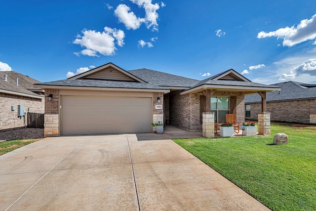 2408 Partridge St, Midland, TX 79705 - ranch-style home featuring a shingled roof, driveway, a front yard, brick siding, and an attached garage