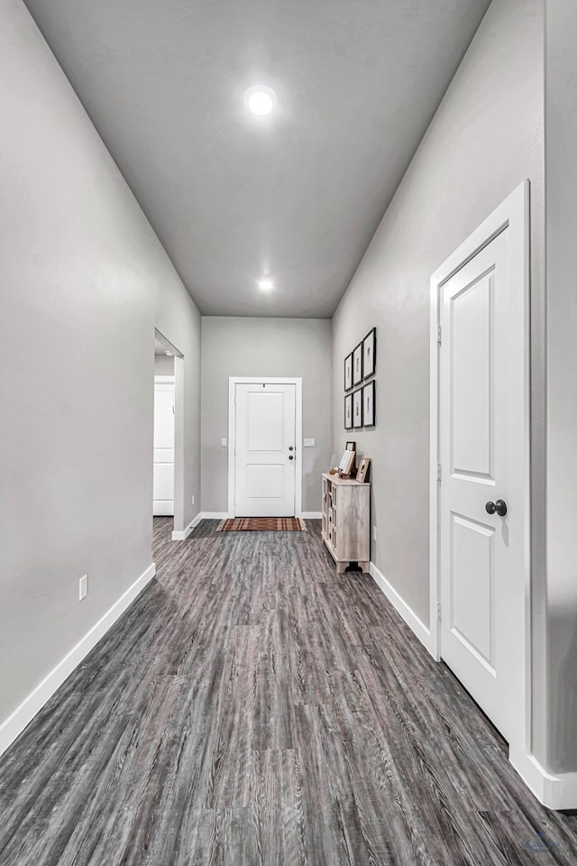 2408 Partridge St, Midland, TX 79705 - foyer entrance with dark wood finished floors and baseboards