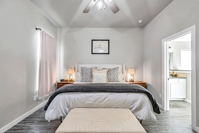 2408 Partridge St, Midland, TX 79705 - bedroom with wood finished floors, ensuite bathroom, and a ceiling fan