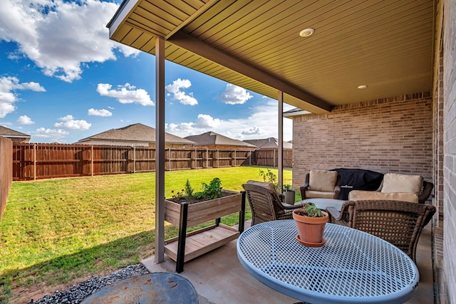 2408 Partridge St, Midland, TX 79705 - fenced backyard with a patio area