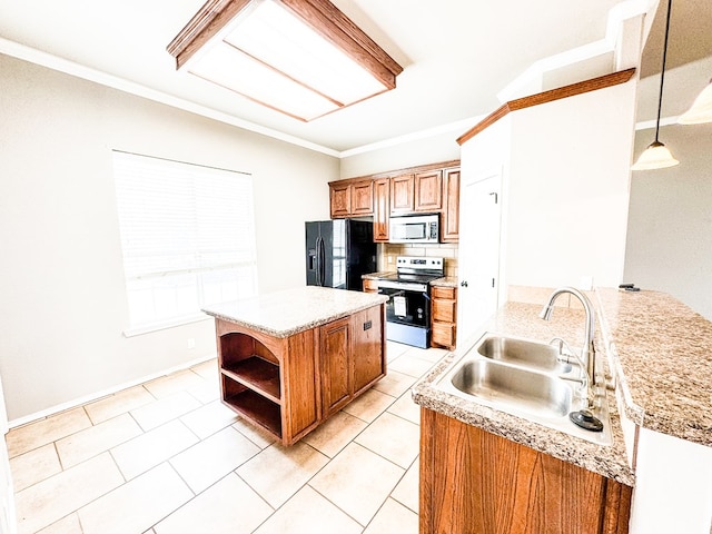 kitchen with a sink, ornamental molding, brown cabinetry, and stainless steel appliances