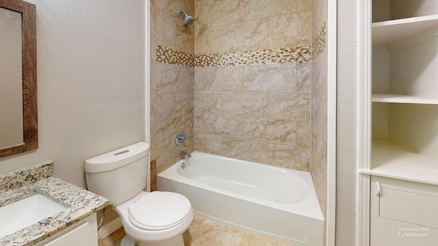 full bathroom featuring a textured wall, vanity, toilet, and shower / bathtub combination