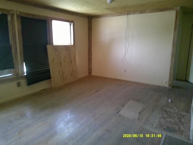 1104 S Monticello St, Big Spring, TX 79720 - unfurnished room featuring wood finished floors