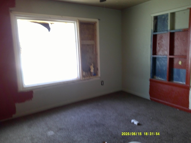 1104 S Monticello St, Big Spring, TX 79720 - spare room featuring carpet