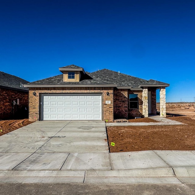 prairie-style house with a garage