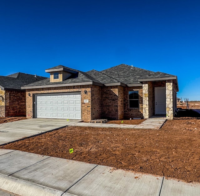 prairie-style house with a garage