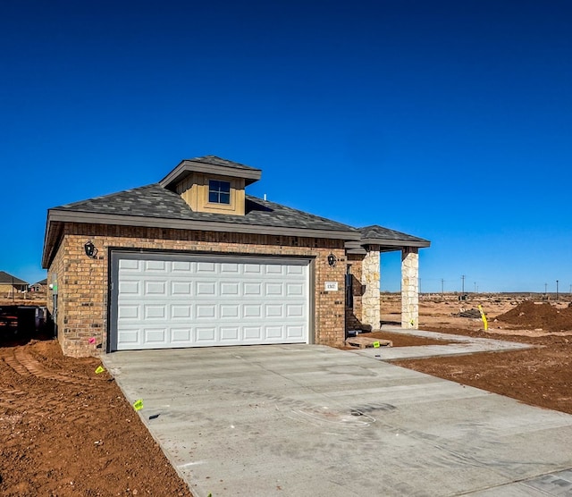 view of front of home featuring a garage